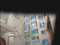 Cute girl stripping for shower