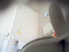 Cute maid piddles on a