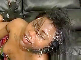 Dirty Black Girl Spits Up During Interracial Face Fuck