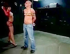 Dominatrix Whipping Her Useless Subject
