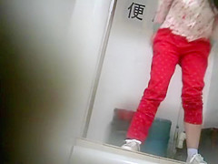 Geeky chinese girl spied while pissing