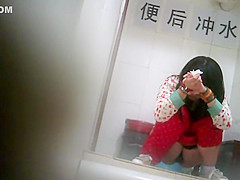 Geeky chinese girl spied while pissing