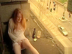 Ginger girl masturbates in public outside her apartment