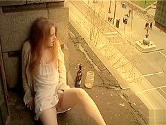 Ginger girl masturbates in public outside her apartment