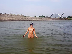 Girl Bathes Naked In The River And Masturbates On The Shore