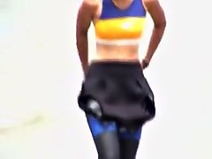 Girl losing down her tight swimsuit on the candid beach vid 07m