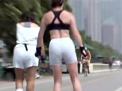 Girls in candid sports shorts roller skating in the street 07zt