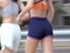 Girls in candid sports shorts roller skating in the street 07zt