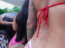 Girls licking each other in the truck