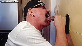 Gloryhole homemade DILF sucks black dong in closeup BJ