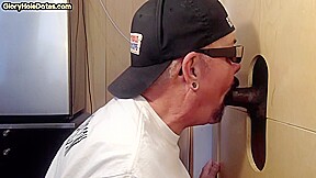 Gloryhole homemade DILF sucks black dong in closeup BJ