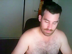 Handsome, hairy-chested, stocky guy-next-door masturbates