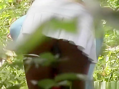 Hooker changing clothes in forest