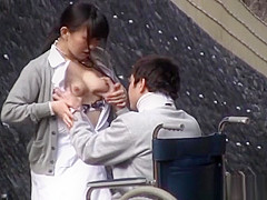 Horny Japanese nurse sucks cock in front of a