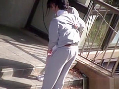 Horny Japanese nurse sucks cock in front of a