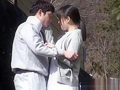Horny Japanese nurse sucks cock in front of a