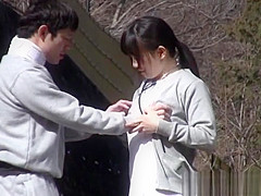 Horny Japanese nurse sucks cock in front of a