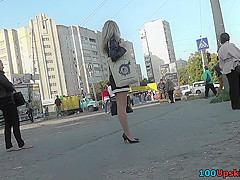 Hot upskirt porn with auburn-haired gal in public