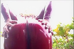 Joanna jet in red latexsuit outdoor