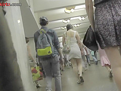 Lady's g-string seen in upskirt footage made in public
