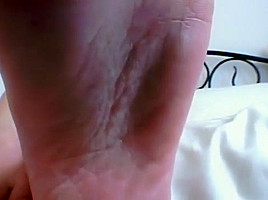 Lexi Lee showing her delicious pink soles and sexy high arches