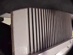 Man with cam trying to see something in change room