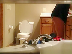 Milf caught in bathroom hidd cam