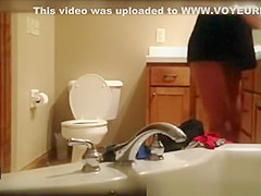 Milf caught in bathroom hidd cam