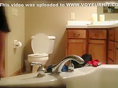 Milf caught in bathroom hidd cam