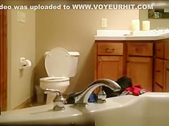Milf caught in bathroom hidd cam