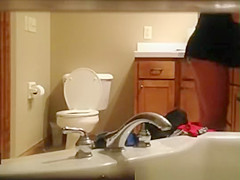 Milf caught in bathroom hidd cam
