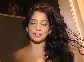 Nadia Ali having fun with black cock in a gloryhole
