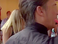 Naked blonde in line at fast food shop