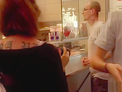 Naked blonde in line at fast food shop