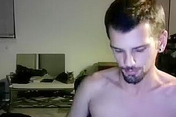 Nice-looking BF is having fun at home and shooting himself on webcam