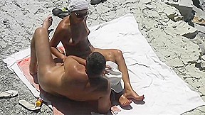 Now girlfriend masturbate him and helped cum on the beach