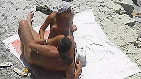 Now girlfriend masturbate him and helped cum on the beach