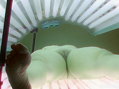 Older Milf Tanning Her Shaved Tight Pussy