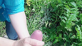 Outdoor handjob by Russian mature woman