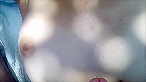 Outdoor quick risky handjob, cum on tits