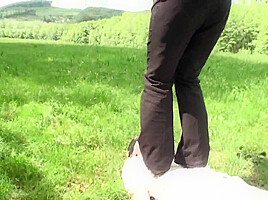 Outdoor trampling punishment with muddy shoes by Femdom Austria