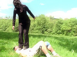 Outdoor trampling punishment with muddy shoes by Femdom Austria