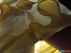 Outlandish upskirt of angel in yellow costume