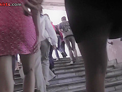 Outstanding upskirt view of two young sexy girlfriends