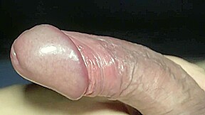 Playing my uncut cock for precum and cumshot close-up
