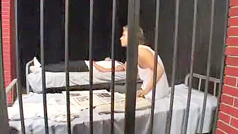 Prison doctor examines inmate