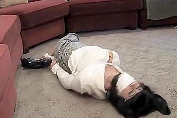 Private detective tied and gagged by a spy