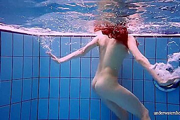 Redhead Marketa In A White Dress In The Pool