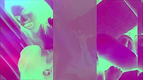 Redhead ladyboy in leopard dress enjoys solo masturbation on the couch