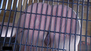 Restrained slave slapping with another sub